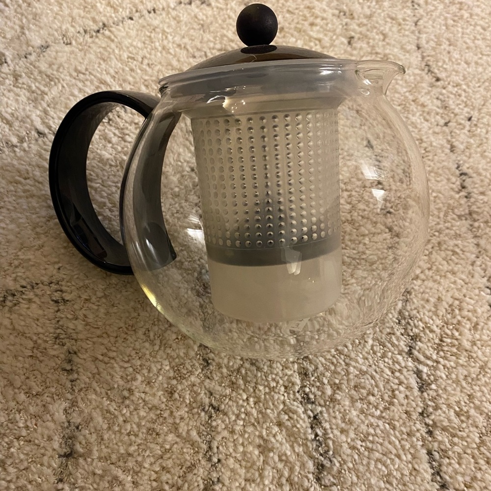Bodum teapot. Glass pot with tea with steeper